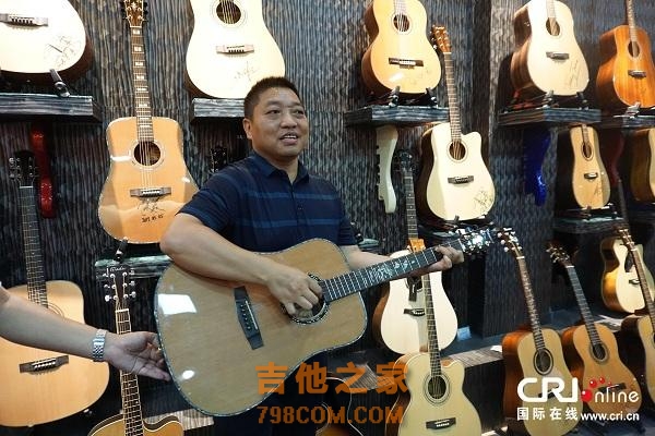 正安县小吉他“弹出”激荡人心的“致富曲”