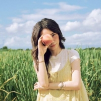 再闯葛莱美奖！华人女歌手背景曝光